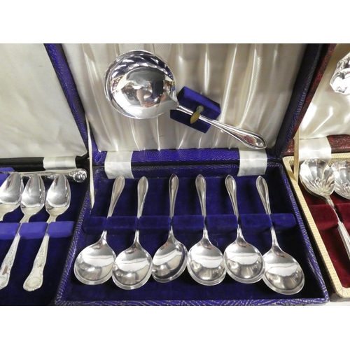 320 - An assortment of cased cutlery sets.