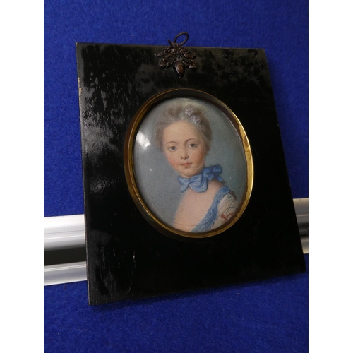 87 - An antique miniature portrait painting of a lady.