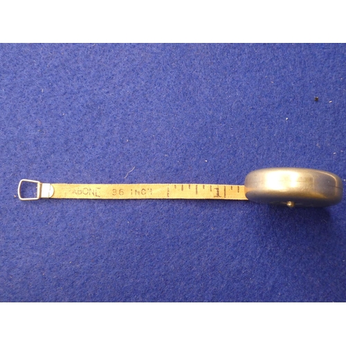 92 - A scarce measuring tape produced by Rabone, advertising William Clark & Sons Ltd Linens (Upperlands)... 