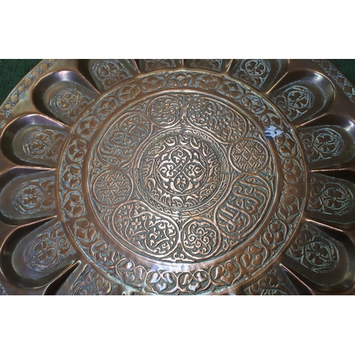 338 - A stunning & highly decorative Islamic tray with unusual indent design, measuring 38cm wide.