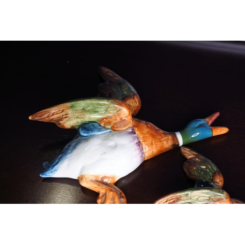 344 - A set of 2 Beswick flying ducks.