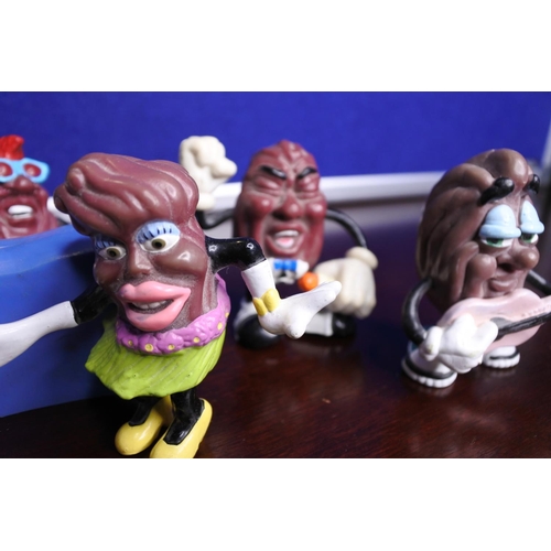 355 - A set of California raisin's.