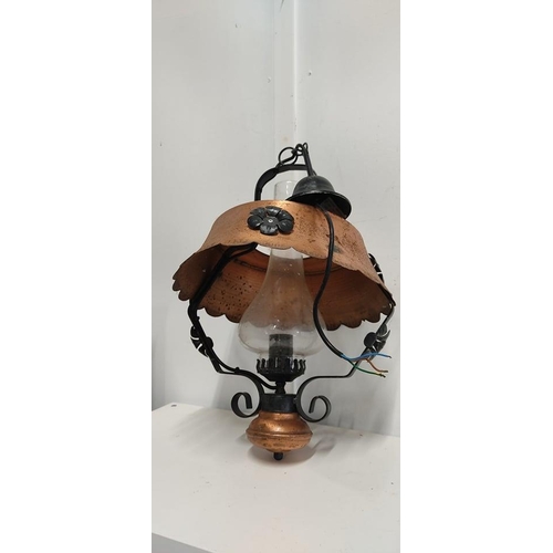 135 - A copper oil lamp which has been converted to electric.