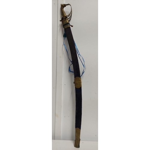 79 - A decorative sword with a camel handle.