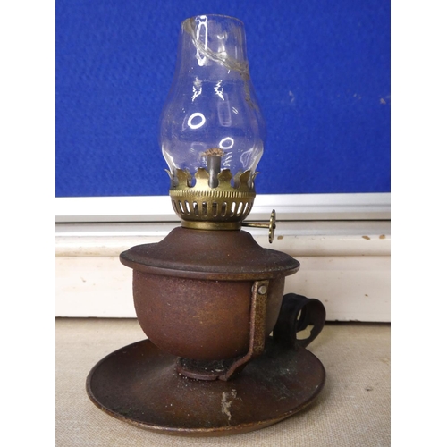 120 - A vintage oil lamp, globe a/f.