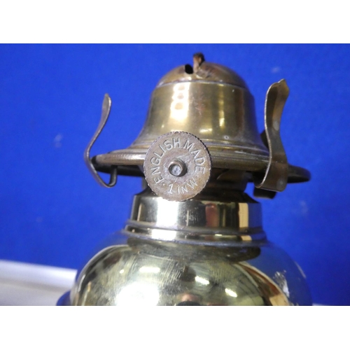 121 - An antique brass oil lamp base.