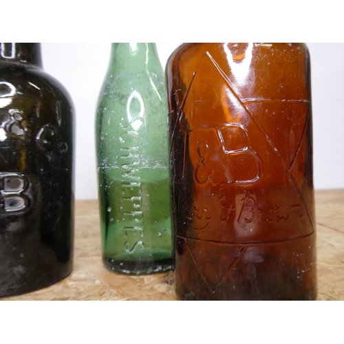 18 - A collection of vintage glass bottles.