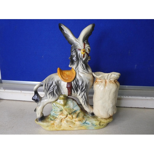 83 - A vintage staffordshire style donkey.