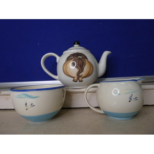 84 - An Arthur Wood horse teapot & more.