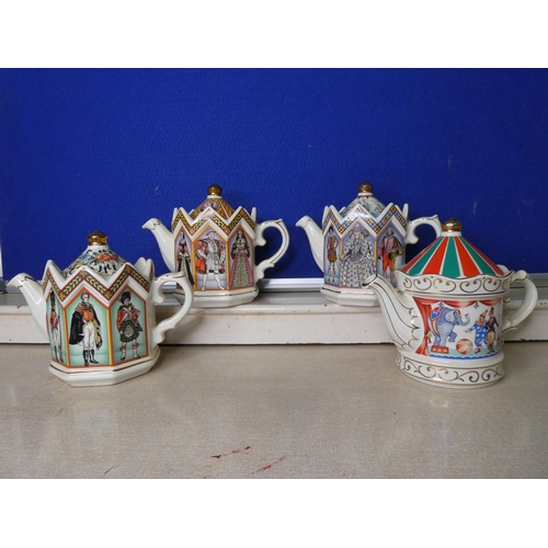 93 - A collection of 4 decorative Sadler teapots.