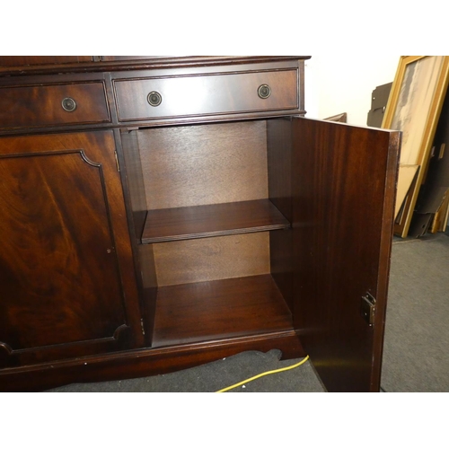 542 - A large antique style bookcase.