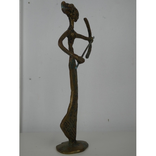 549 - A decorative brass figure.