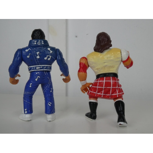 550 - 2 retro Hasbro Wrestling figures.