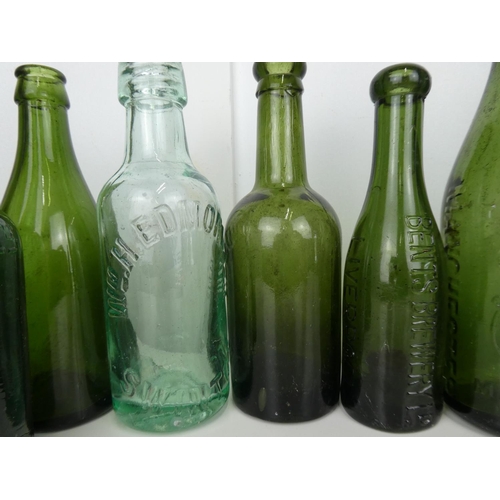 570 - A collection of antique/ vintage bottles.