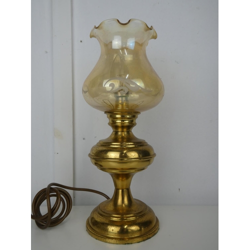 604 - An electric oil lamp.