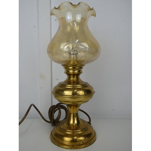 604 - An electric oil lamp.