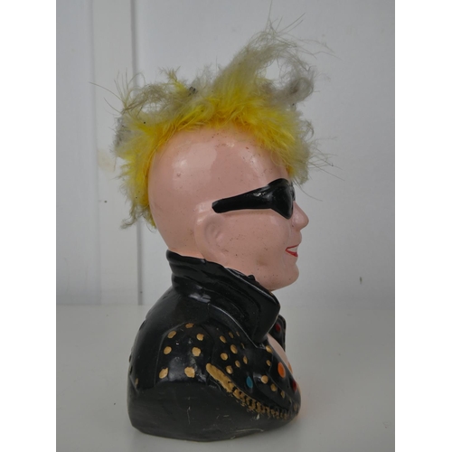 609 - A ceramic 'Punk' moneybox.