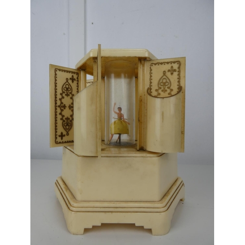 615 - A decorative music box with dancer.