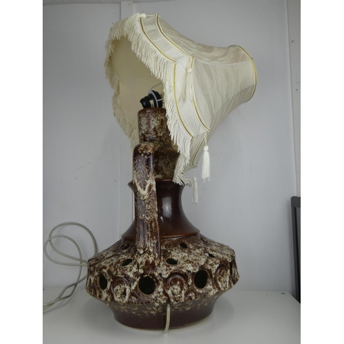 634 - A large vintage pottery table lamp, in need of new fitting.