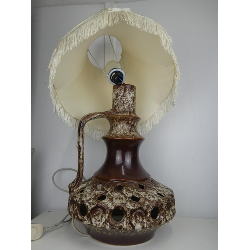 634 - A large vintage pottery table lamp, in need of new fitting.