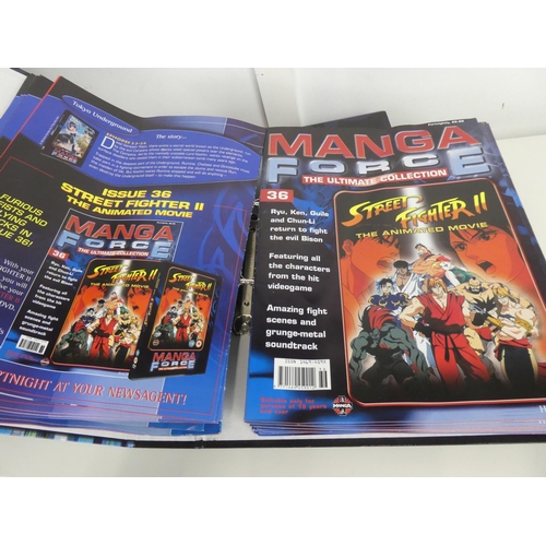 687 - 2 Manga Force folders with contents.