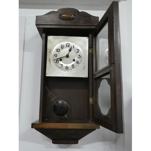 688 - A vintage wall clock.