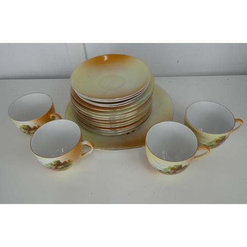 702 - A decorative Victoria China tea set.