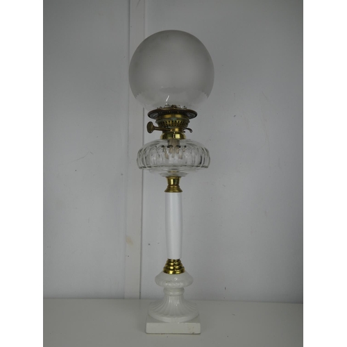 720 - A stunning antique oil lamp.