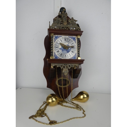 721 - An antique style wall clock.