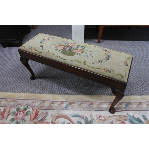 1111 - An antique footstool with tapestry top.