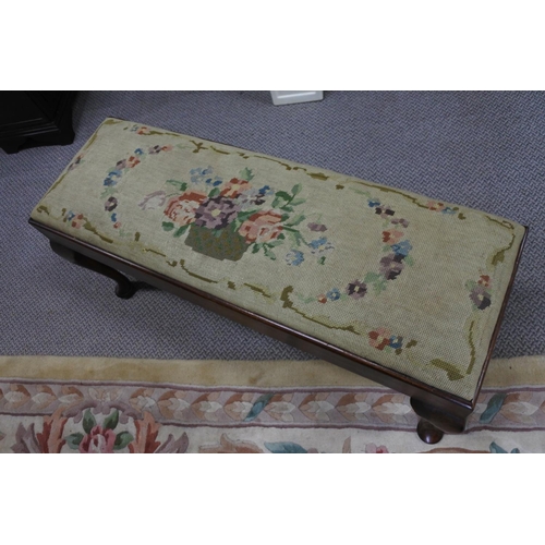 1111 - An antique footstool with tapestry top.