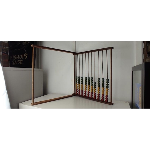 87 - A vintage wooden abacus.