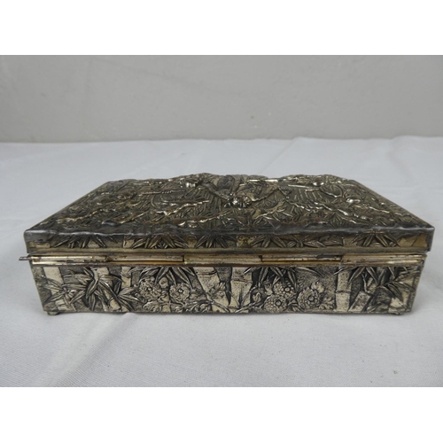 109 - A decorative vintage silver plated cigarette/ trinket box.