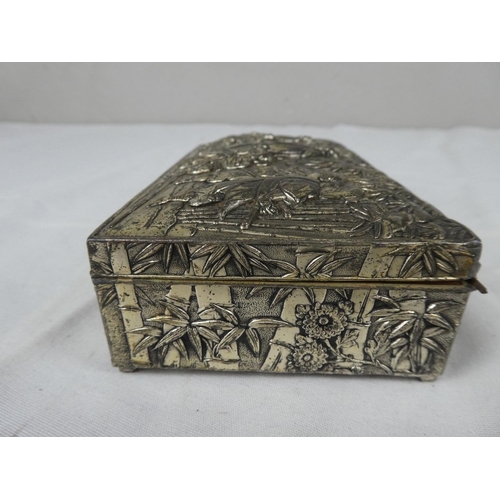 109 - A decorative vintage silver plated cigarette/ trinket box.