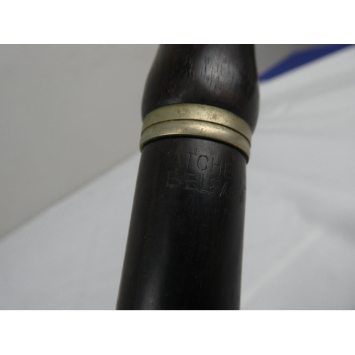 65 - A wooden flute.