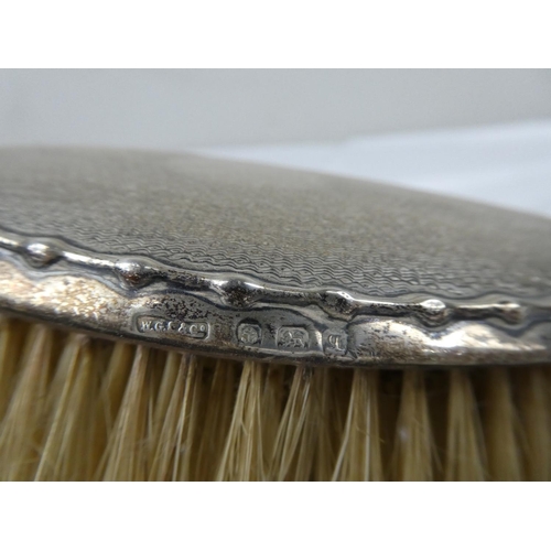 71 - A fully hallmarked set of vanity brushes.