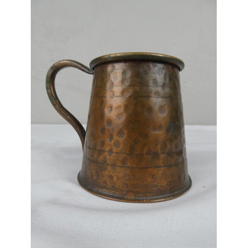 72 - A copper tankard.