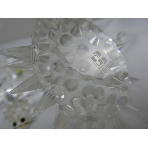 76 - A large collection of Swarovski Crystal animals.