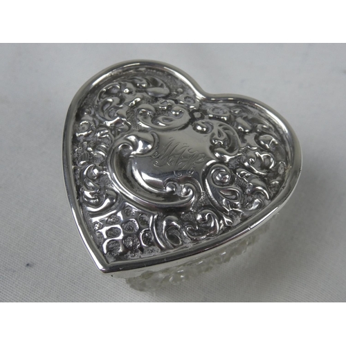 88 - A Sterling Silver lidded heart shaped trinket box.