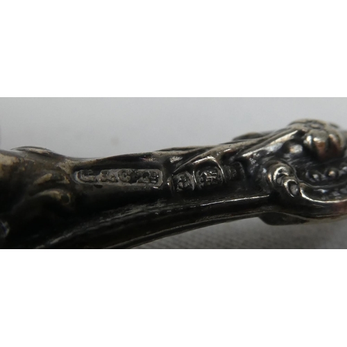 93 - A Sterling Silver handled dressing table tool.