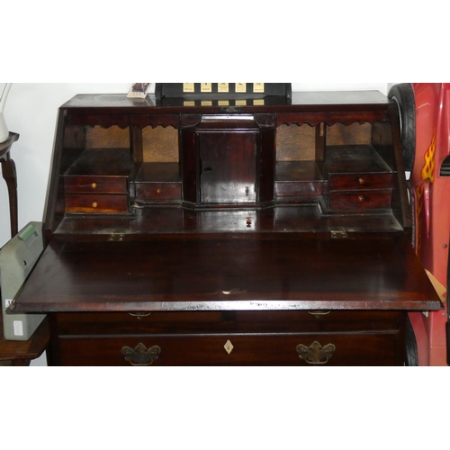 107 - An antique mahogany writing bureau.