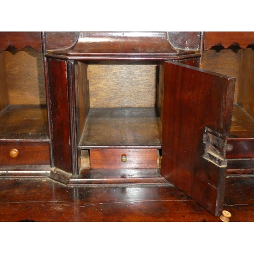 107 - An antique mahogany writing bureau.
