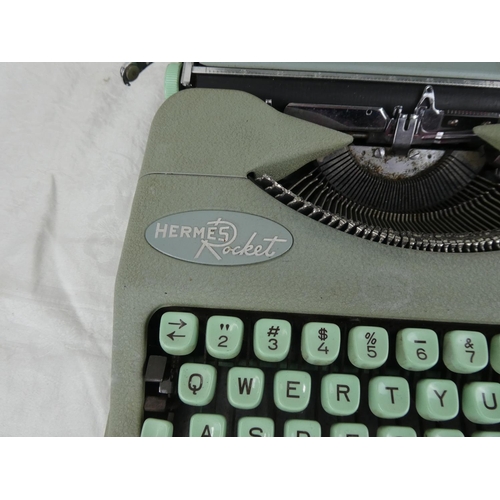 111 - A vintage Hermes Rocket typewriter in case.