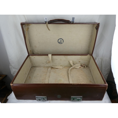 74 - A vintage/ retro suitcase by maker Revelation Luggage.