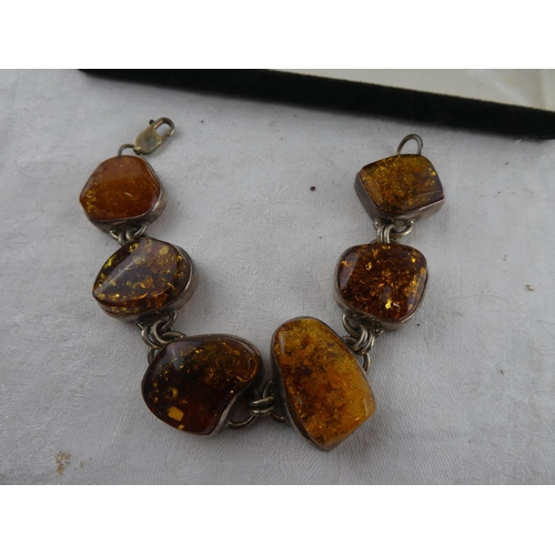 135 - A stunning sterling silver and amber bracelet by designer Marta Napora-Kos.