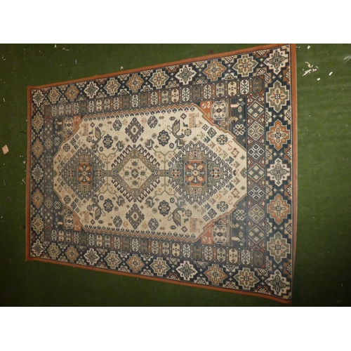 151 - A decorative floor rug.