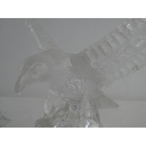 161 - A crystal 'clock' eagle along with crystal lion.