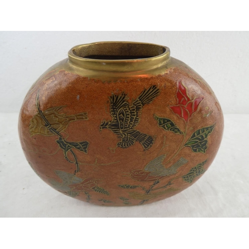 178 - A brass and enamel vase with bird detail.