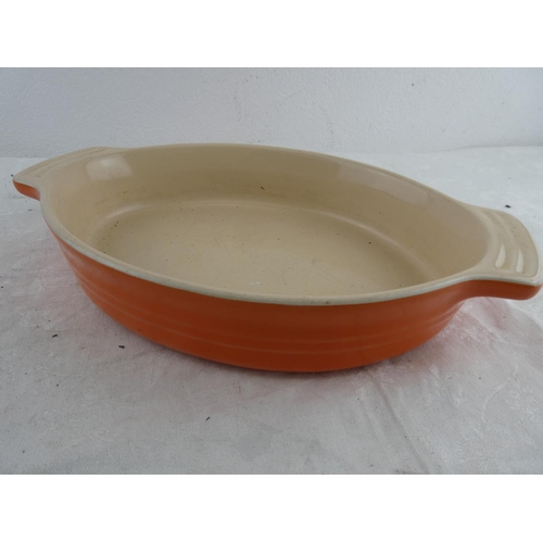 181 - A Le Creuset plate and pie dish.