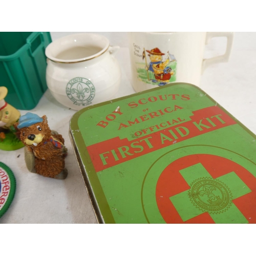 184 - A collection of scout items to include Old American Scout First Aid Tin, Boy Scouts of Ireland cauld... 